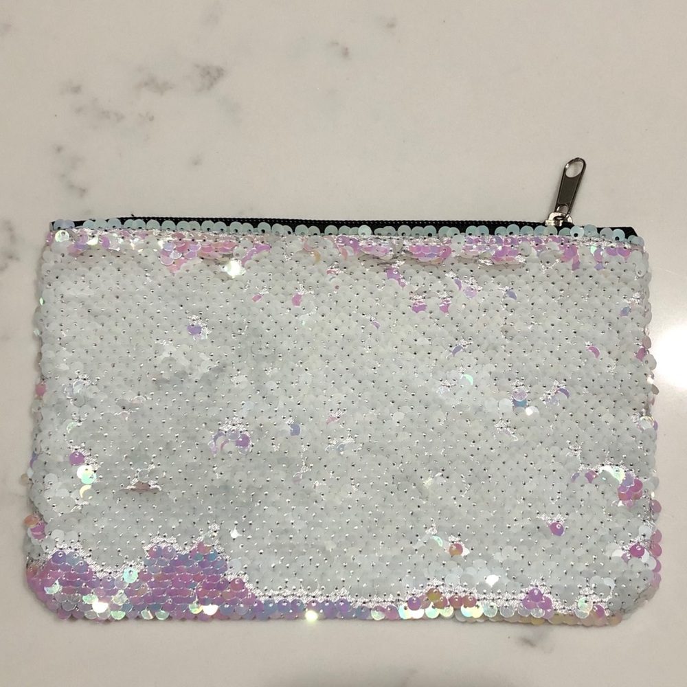 Flip sequin clutch